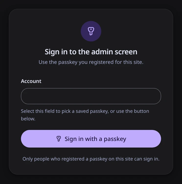 The admin sign-in screen with the Sign in with a passkey button.