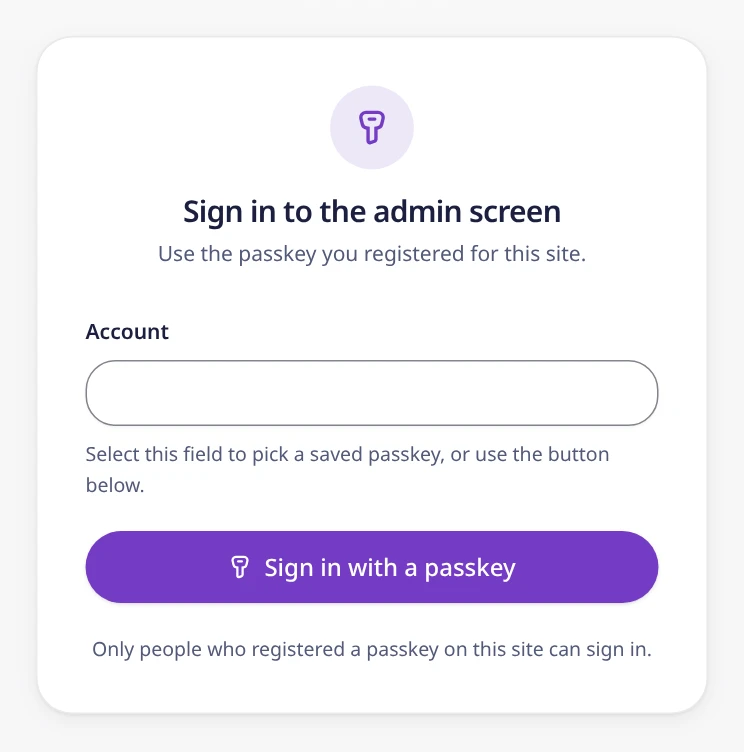 The admin sign-in screen with the Sign in with a passkey button.